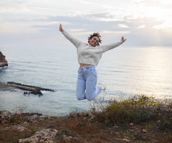 full-shot-woman-jumping-outdoors